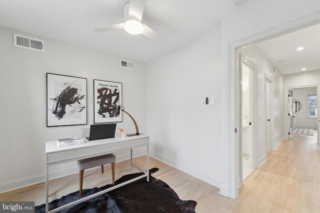 office featuring ceiling fan and light hardwood / wood-style floors