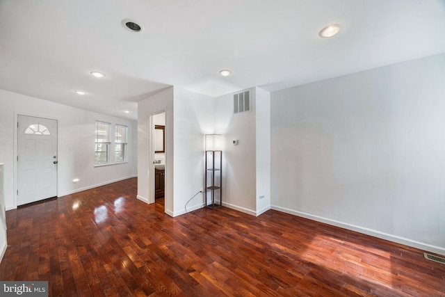 foyer entrance featuring dark hardwood / wood-style flooring