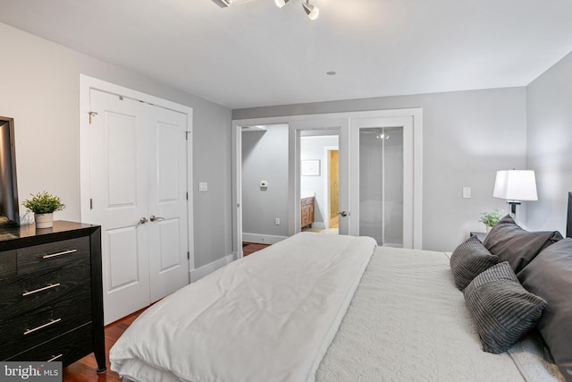 bedroom featuring hardwood / wood-style floors