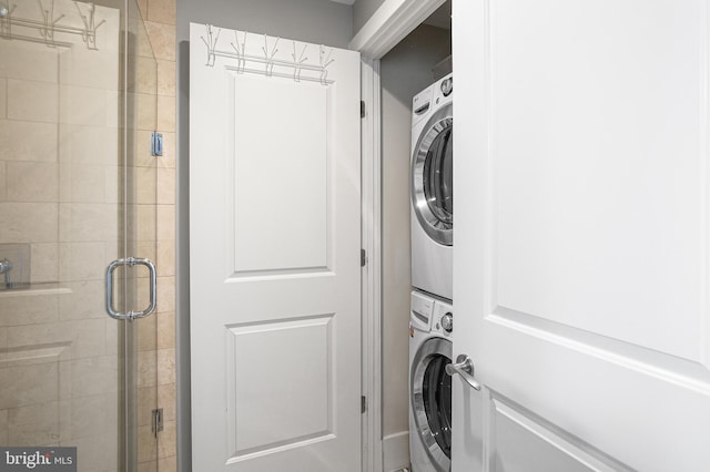 laundry room with stacked washer and clothes dryer