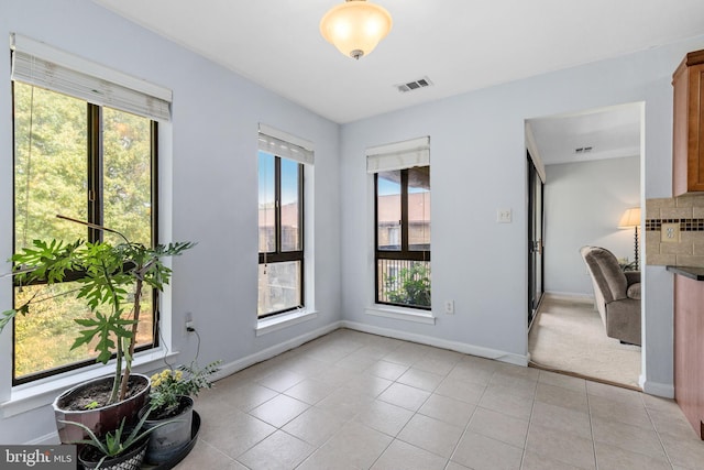 interior space featuring light tile patterned flooring