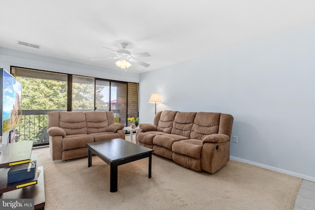 living room with ceiling fan