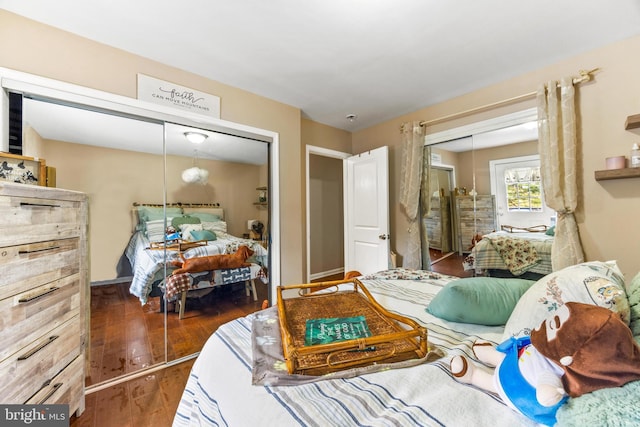 bedroom featuring wood finished floors