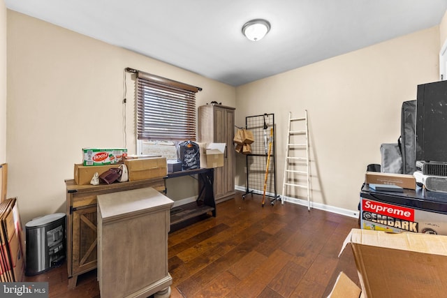 office space featuring baseboards and hardwood / wood-style floors