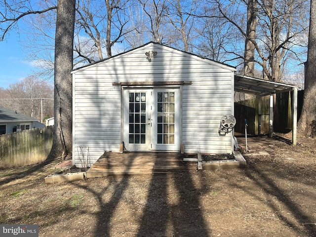 view of outbuilding featuring a carport