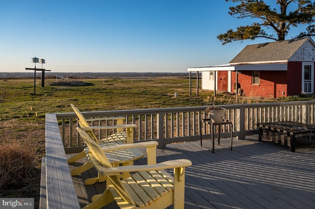 wooden terrace with a rural view