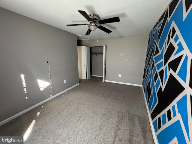 unfurnished bedroom featuring ceiling fan, carpet floors, and a closet