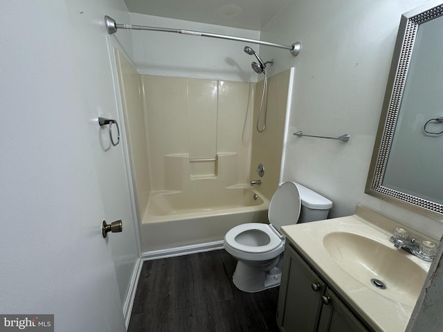 full bathroom with shower / bathtub combination, wood-type flooring, toilet, and vanity