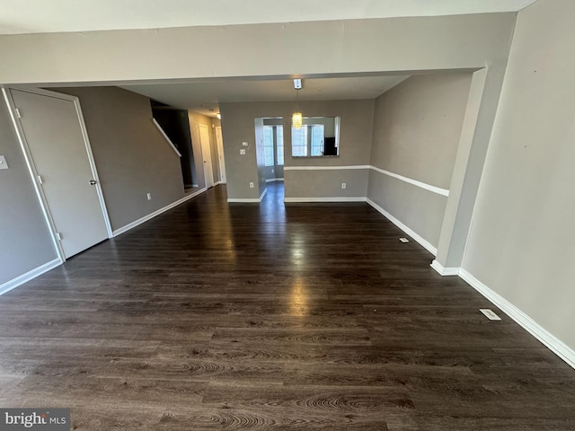 interior space with dark wood-type flooring