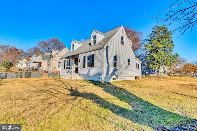 view of front of home featuring a front lawn