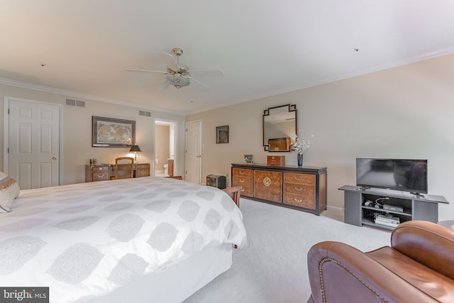 bedroom featuring ornamental molding, carpet, ceiling fan, and visible vents