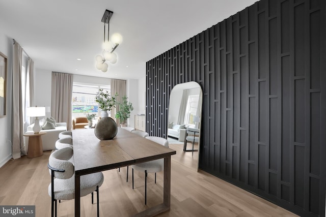 dining room with light hardwood / wood-style flooring