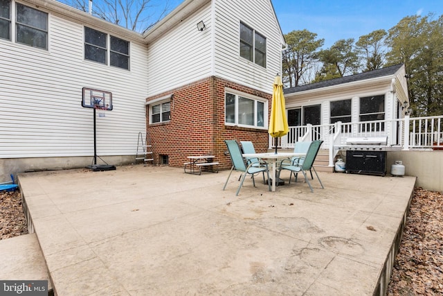 view of patio featuring outdoor dining area