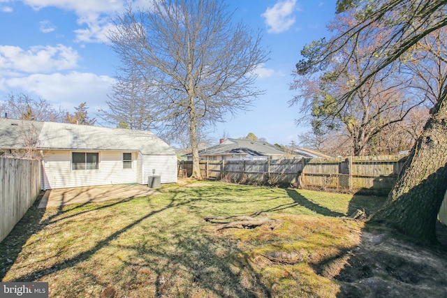 view of yard with a fenced backyard