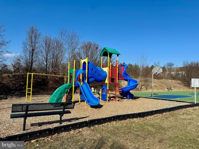 view of play area with basketball hoop