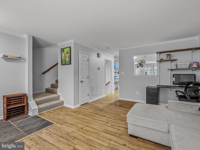 living room featuring ornamental molding and wood finished floors