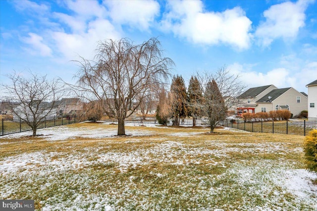 view of yard covered in snow