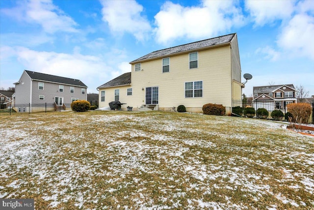 view of snow covered house