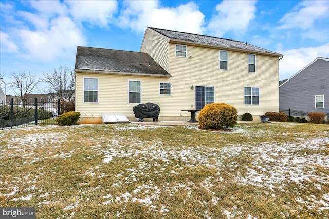 snow covered property featuring a patio area