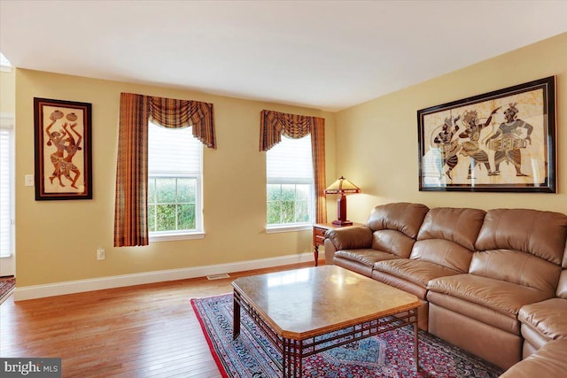 living room with light hardwood / wood-style floors