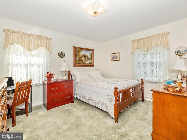 bedroom with light carpet