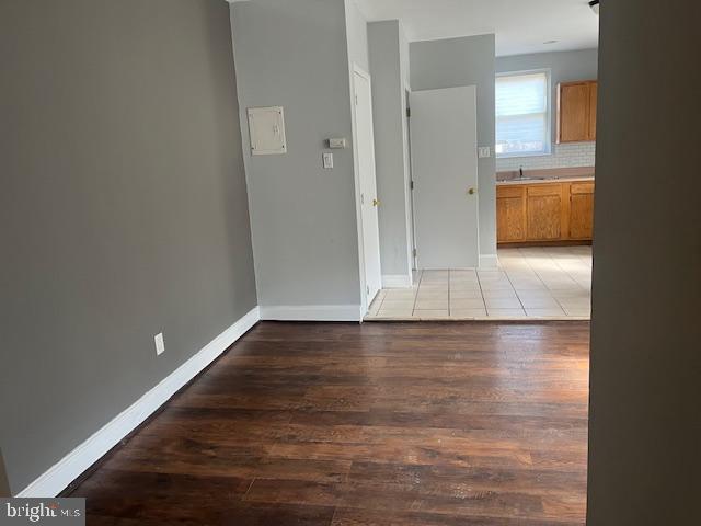 interior space featuring sink and hardwood / wood-style flooring