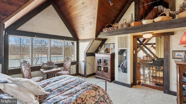 bedroom with lofted ceiling, wood ceiling, light carpet, and baseboards