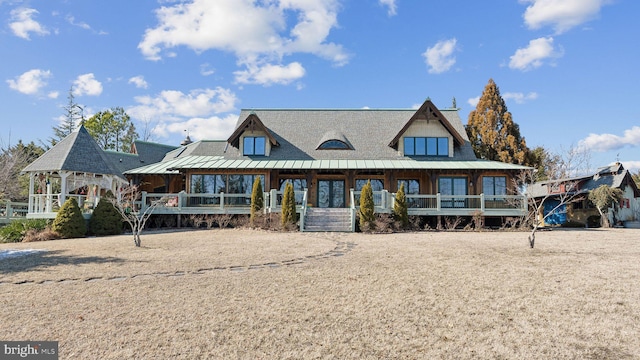 view of front facade featuring metal roof and a standing seam roof