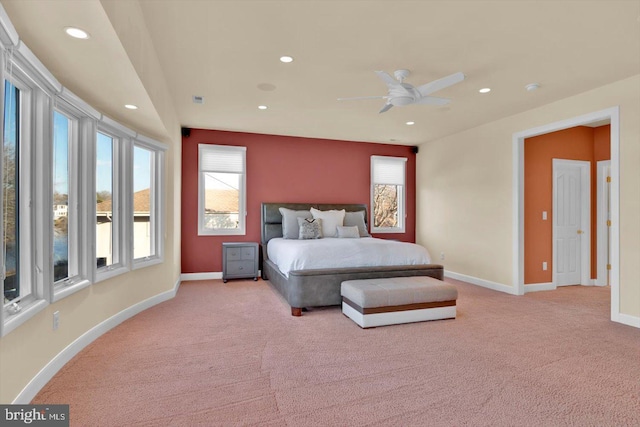 bedroom with light colored carpet and ceiling fan