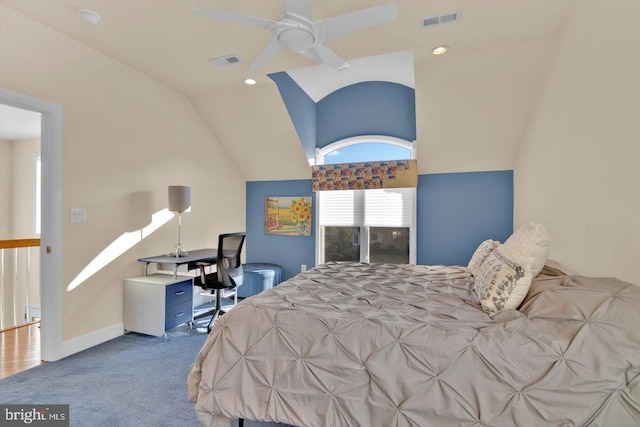 carpeted bedroom featuring lofted ceiling