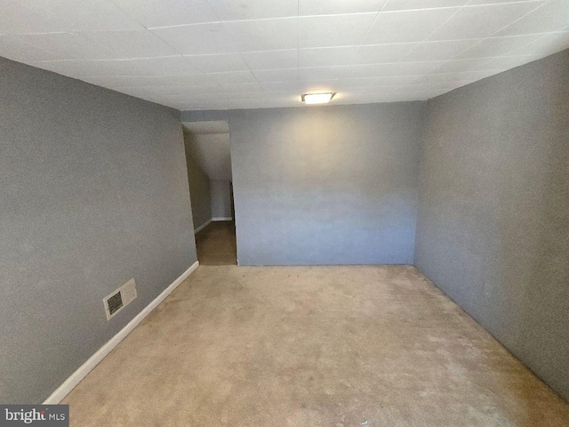 basement featuring carpet floors