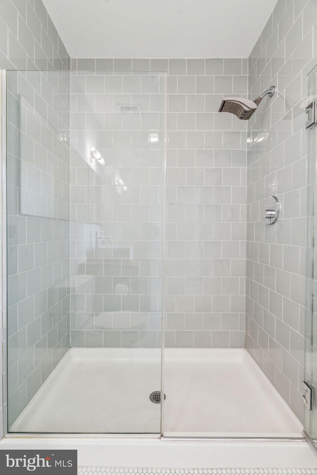 bathroom with an enclosed shower