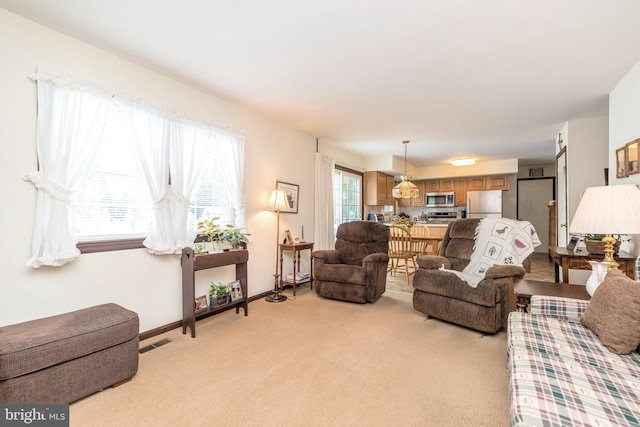 living room with light carpet