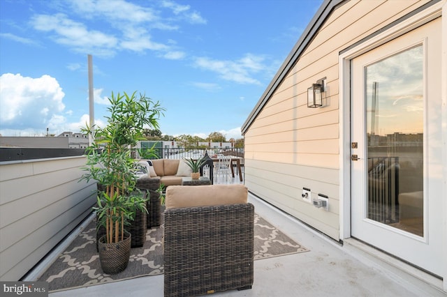 exterior space featuring an outdoor living space and a patio area