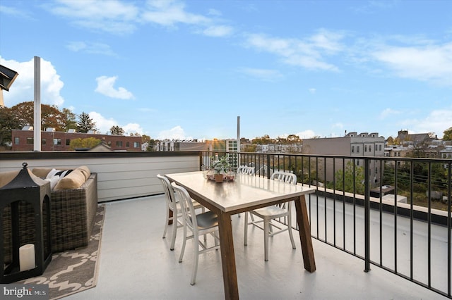 view of patio featuring a balcony