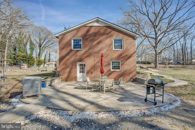 back of house featuring a patio