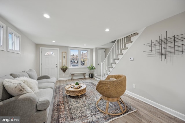 living room featuring plenty of natural light and light wood-type flooring