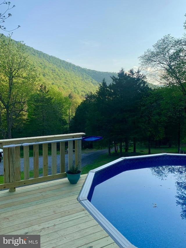 147 Day Owens Dr, Franklin, WV 26807 - view of pool with a deck with mountain view