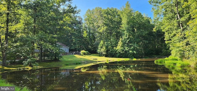 exterior space with a water view