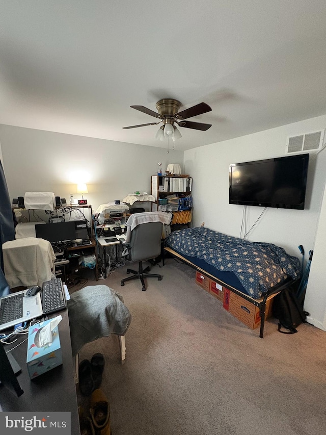 carpeted bedroom featuring ceiling fan