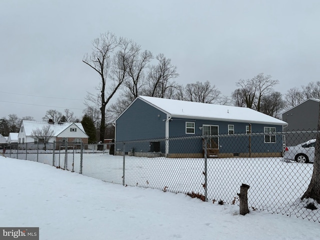 view of snow covered property