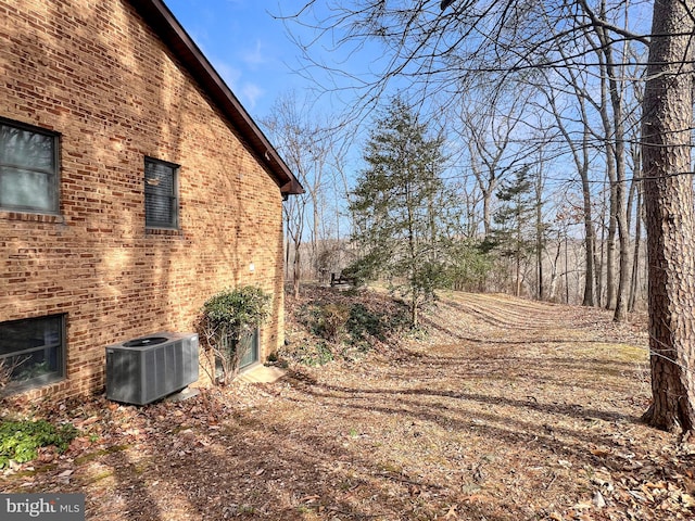 view of home's exterior featuring central AC unit