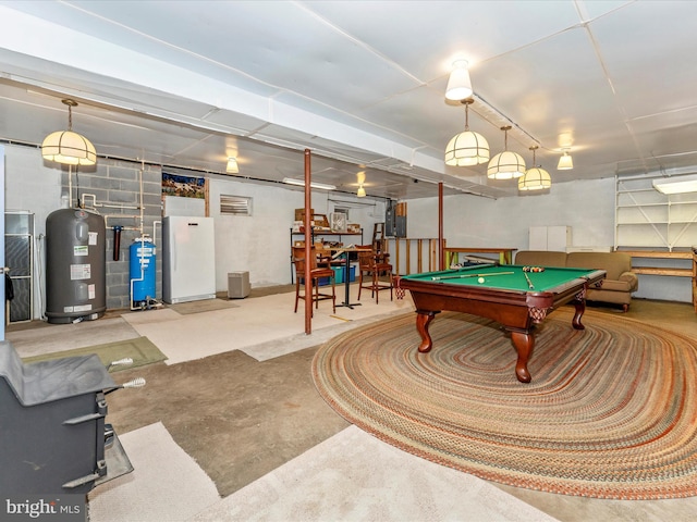 playroom featuring billiards, water heater, and concrete flooring