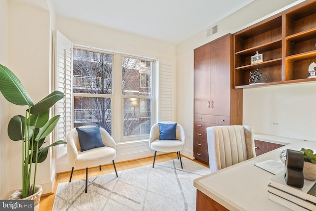 home office with light wood-type flooring