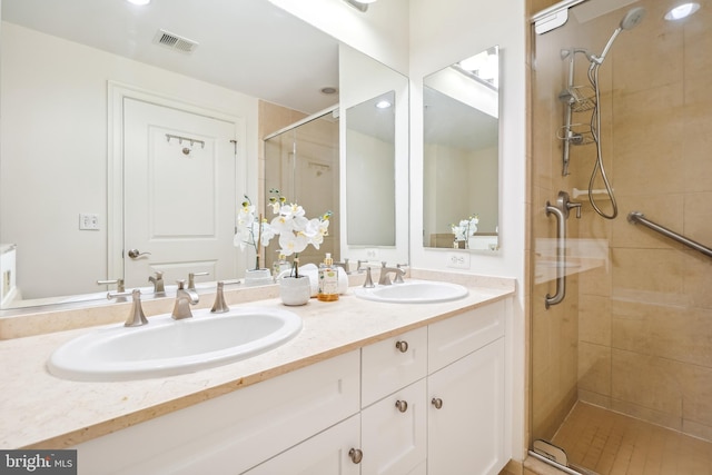 bathroom featuring vanity and walk in shower