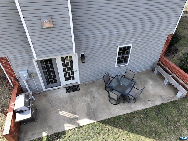 view of patio / terrace with ac unit and french doors