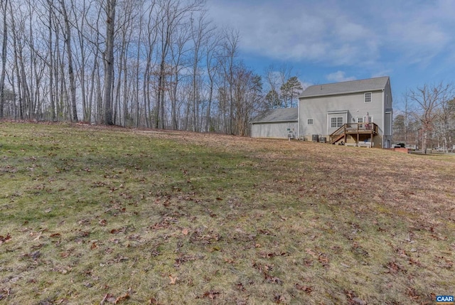 view of yard with a wooden deck