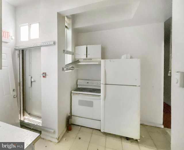 2130 N 19th St, Philadelphia, PA 19121 - kitchen with white appliances, white cabinets, under cabinet range hood, and light countertops