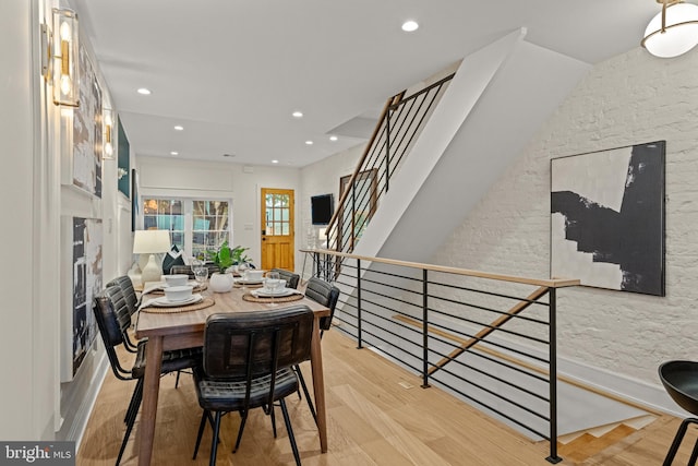 dining space featuring light hardwood / wood-style floors