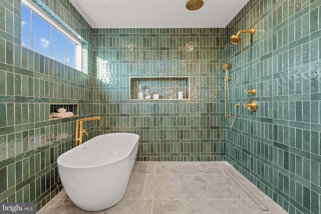 bathroom featuring independent shower and bath and tile walls